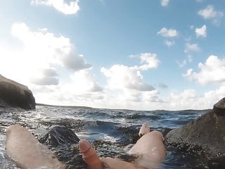 Jerking off by the sea