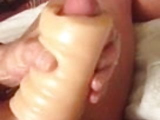 Intense cum with a sleeve and view of balls and piercing