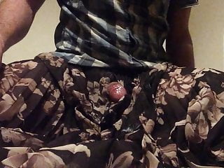 Wanking in pleated floral skirt and cum