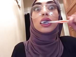 Hijabi Brushing her Pretty Teeth