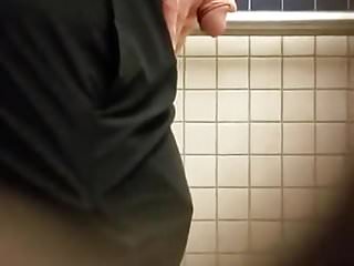 College guy taking a piss!