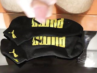 Cum on black Puma socks