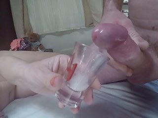 Shooting hot cum load in a shot glass
