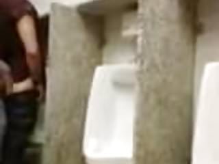 Cruising for sex and breeding a slut at a urinal while being