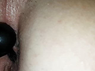 Butthole is fucked by a ball plug
