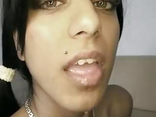 Pretty eyed Indian Suravinda takes a load in her mouth