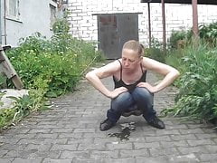 Russian Mature pissing on the street