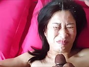 Asian MILF blows her Black Cock and gets her face sprayed