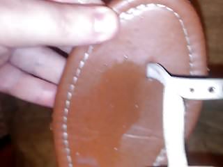 Cumming on leather sandal