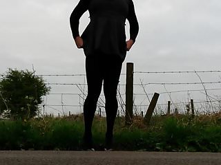Tights and wet look dress