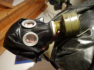 Rubber Gasmask Nun Is Ramming Asshole With Two Big Dicks
