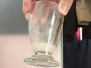 Huge close-up cumshot in a cup