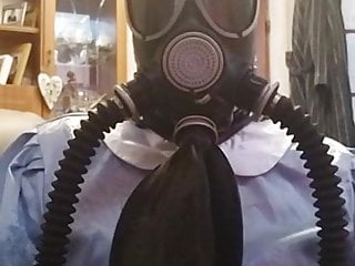 Sissy maid in gas mask