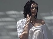 Lauren Cohan modeling in a wet T-shirt with pokie nipples