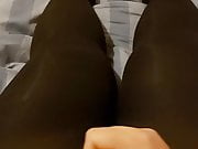 Cumming through opaque black tights