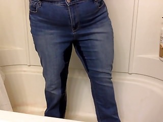 Wet jeans in the shower for Ade