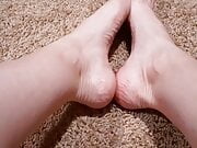 Rubbing my soft bare feet together