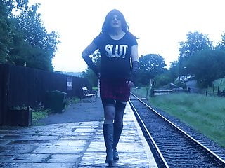 Walking along a railway platform outdoor...