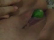 Masturbate with a courgette inside pussy