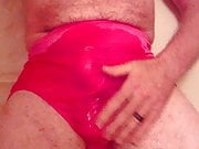 Pissing in pink shadowline panties.