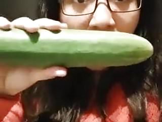 Teasing fat bitch takes a cucumber...