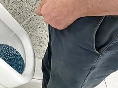 Moustached grandpa pissing 