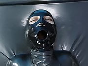 Girl in Latex Catsuit Enters Vacbed
