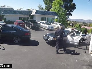 Caught on camera! wife sucks off cop to get her husband off