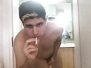 Naked cigarette smoker - video