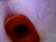 Big red anal plug pops out of hole