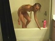 WET Blonde strips and masturbates in the tub