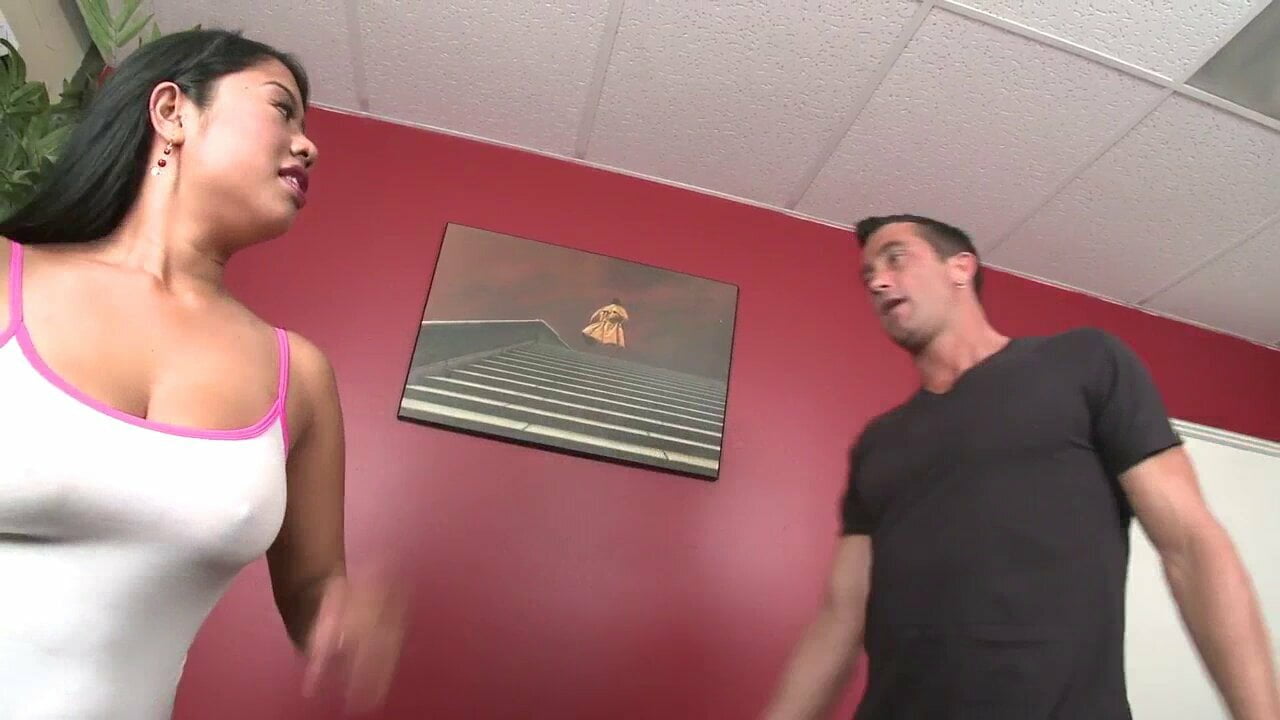 Busty brunette Kya Tropic gives a blowjob and gets fucked