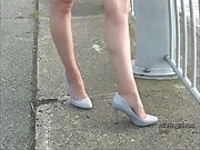 Leggy brunette teases long legs in high heel shoes fetish