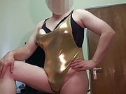 Fake Boobs - some posing in shiny gold swimsuit, shaved body