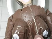 Black inflatable doll takes piss and cum