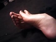 Pinky G's Play with the cum on my feet slave