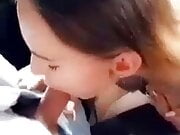 Girl sucking TS in car