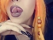 Sexy babe shows off her split tongue