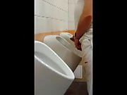 Another guy caught wanking at urinal