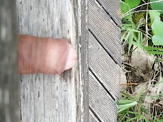 Uncut cock pissing outside