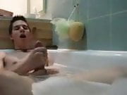 Twink jerking off in bathtub