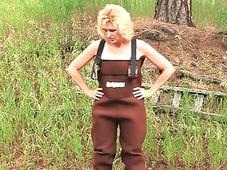 She gets a Facial while in her brown overalls 