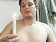 Slave playing with candle wax