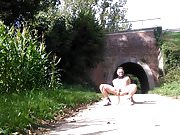 naked in front of bridge