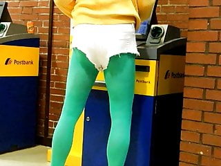 White Hotpants and green pantyhose in public office.