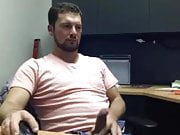 Handsome dude jerking at office