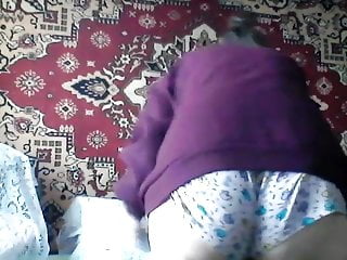 Hacked laptop camera. Girl in short shorts