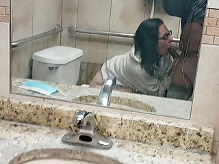 Public bathroom blowjob