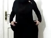 Girl in a hijab dances and strips showing boobs and ass