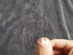 Spraying my cum over dark towel 